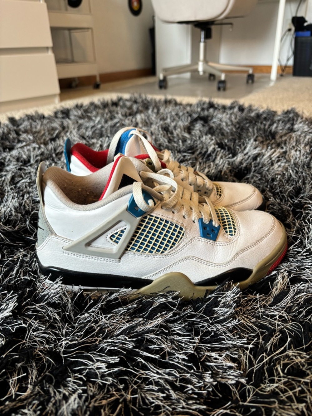 Nike Jordan 4’s in Red and Blue